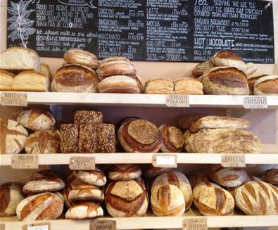 Two Magpies Bakery bread on shelves Two Magpies Bakery bread on shelves