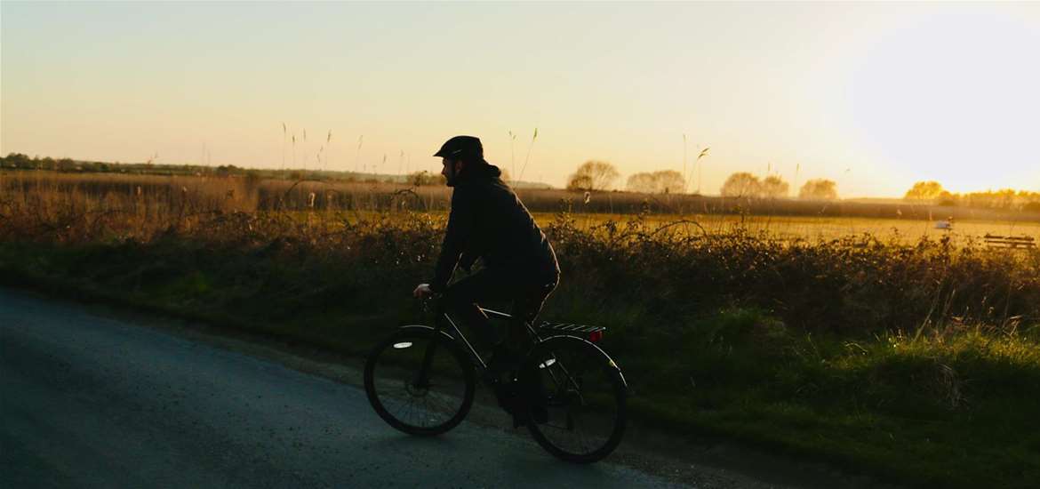 TTDA - Southwold Cycle Hire - Cyclist at sunset