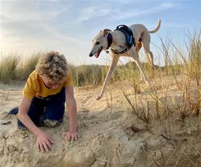 Boy with Dog at Covehithe - Jane Albery
