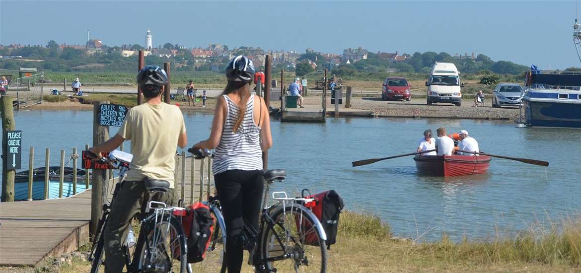 Cycle Breaks - cyclists at Walberswick Ferry near Southwold Suffolk