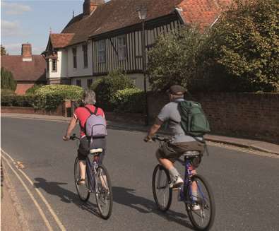 Cycling - people cycling on road