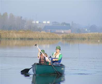 TTDA - Iken Canoe - Woman and Child TTDA - Iken Canoe - Woman and Child
