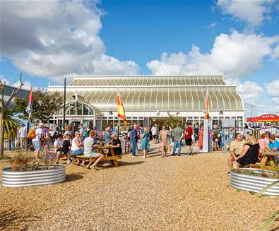 People sitting in the garden of East Point Pavilion