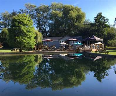 F&D - The Tea Hut - View of hut and lake