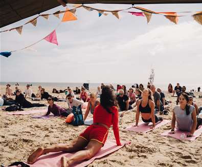 Yoga on the beach at First Light Festival