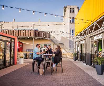 TTDA - Beach Street Felixstowe - Friends at table (c) Emily Fae Photography