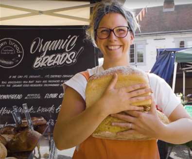 TTDA - East Suffolk Markets - Woman holding bread