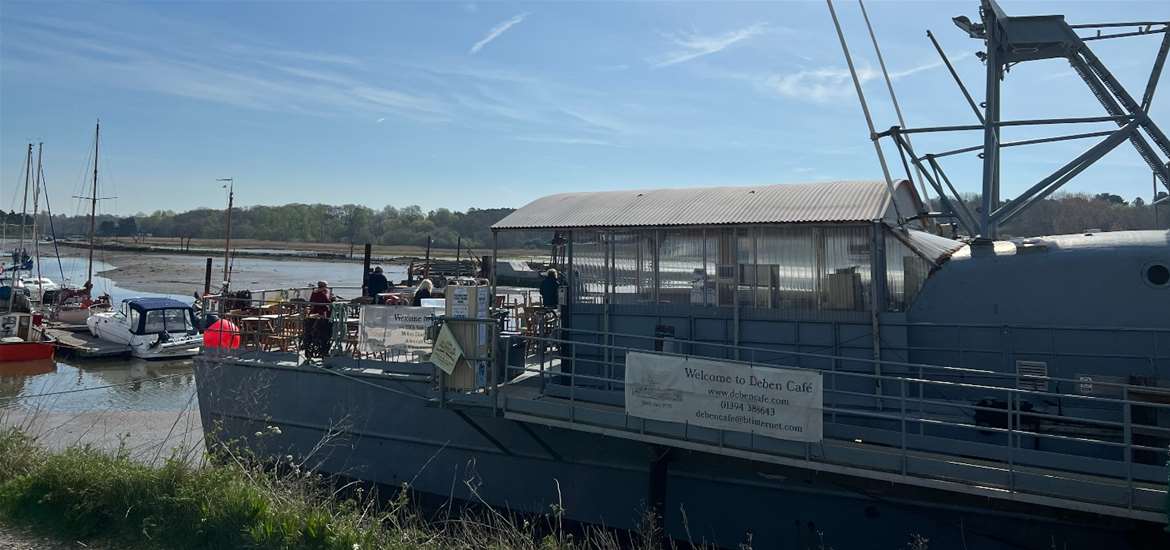 FD - Deben Cafe - Boat with people sitting on deck