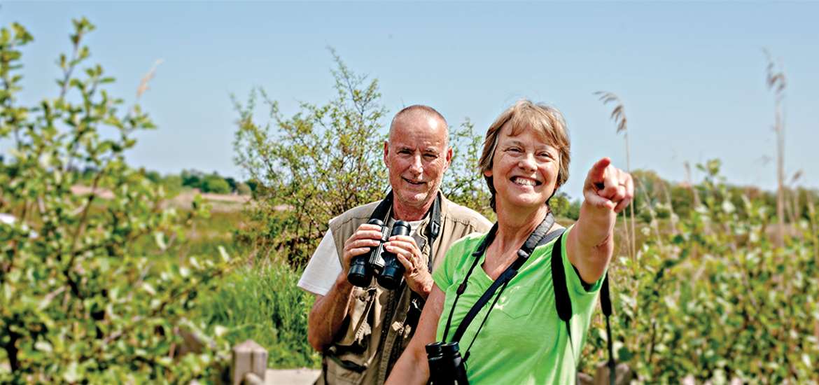 TTDA - Suffolk Wildlife Trust - Couple with Binoculars (c) John Ferguson