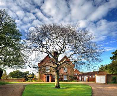 The Red House - View of garden and house